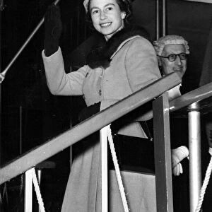 Queen Elizabeth II waving to the crowd at Jarrow. October 1954