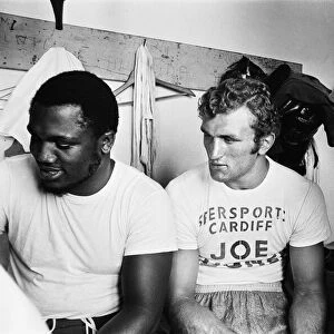 World Heavyweight Champ Joe Frazier (left) with Joe Bugner (centre). 27th June 1970