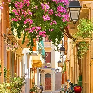 Blooming flowers decoration. Rethymno old town, Crete Island, Greece