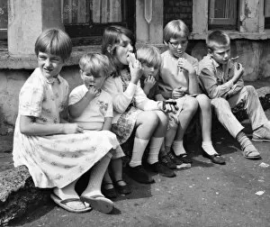 Children eating ice cream on a Balham street, SW London
